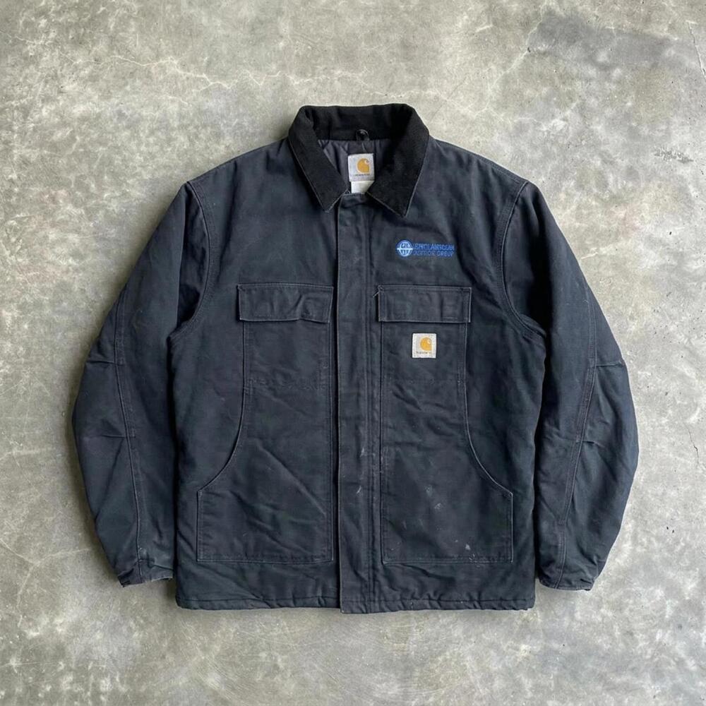 Vintage Carhartt duck canvas work jacket made in USA with quilted lining